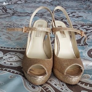 Gold glittery platform peep toe stilettos